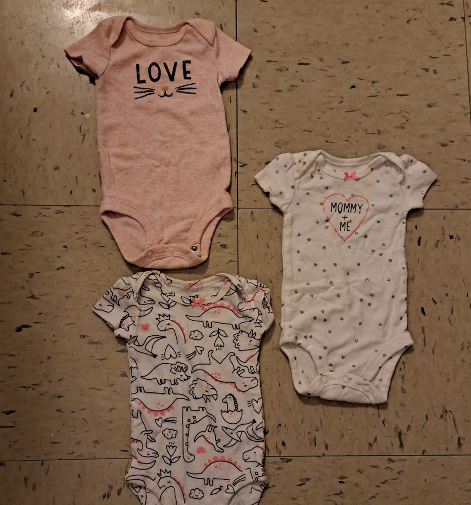3 pack of Carter's Newborn onsies baby girl